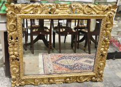 Rectangular gilt-framed wall mirror, scroll and foliate decorated