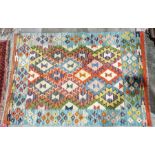 Chobi orange ground kilim with lozenge trelliswork and floral border, 155cm x 107cm