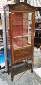 Inlaid mahogany display cabinet with scroll and anthemion inlay to the arched top, two shelves