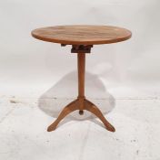 Oak Arts & Crafts-style birdcage tripod occasional table, the circular top having birdcage below, on
