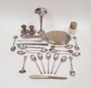 Assorted silver spoons and souvenir spoons, a silver trumpet-shaped vase, Sheffield 1912, a silver-