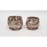 Two similar early 20th century napkin holders, pierced decoration with beaded rims, one inscribed '