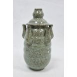 20th century Chinese flower stem vase in a pale ground celadon crackle glaze, the central stem