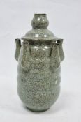 20th century Chinese flower stem vase in a pale ground celadon crackle glaze, the central stem