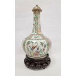 19th century Canton lidded onion-shaped vase in famille rose colours, the body decorated with