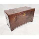 Chinese carved camphorwood chest, the top carved with birds and palm trees, the front and sides with