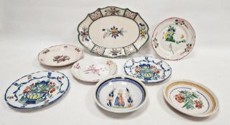 Collection of French faience, 19th century and later, including a pair of St. Clement plates painted