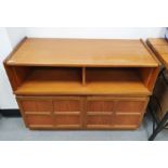 Mid 20th century Nathan teak tv cabinet the two section cabinet over a twin panel cupboard on raised