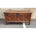 19th century oak coffer the two board top with thumb-moulded edge, the three panel front with