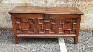19th century oak coffer the two board top with thumb-moulded edge, the three panel front with