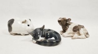 Royal Copenhagen models of a cat, a guinea pig and a cow, printed green and blue wave marks, model