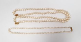 Set of simulated graduating pearls on 9ct gold clasp and a set of two-string pearl necklace on