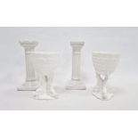Pair of German 'Dudley & Co' white glazed porcelain column-shaped stands with printed green marks,