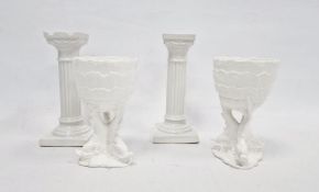 Pair of German 'Dudley & Co' white glazed porcelain column-shaped stands with printed green marks,