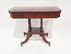 Early 19th century inlaid mahogany foldover top card table, square with canted corners, the swivel