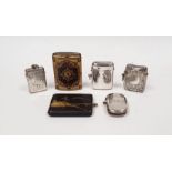 Japanese Komai cigarette case decorated with mountain and bridge, four silver vesta cases and a