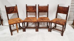 Four oak Jacobean style dining chairs with leather padded seats and backs on stretchered turned