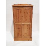 Modern pine two door children's wardrobe on plinth base H 150cm X W 76cm X D 53cm together with