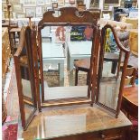 Walnut three-section dressing table mirror with acorn finials and shaped top