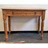 Late 19th century pine side table with single drawer on tapering turned legs