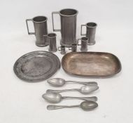 Pewter items to include a graduated set seven measure mugs, four spoons, plate and white metal dish