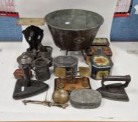 Vintage postal scales, a metal pan on four supports, two smoothing irons, assorted pewter pieces and