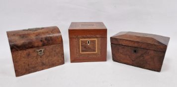 Three tea caddies, the first dome topped walnut with brass shield and swag cartouche, the second