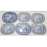 Seven Staffordshire ironstone blue and white transfer printed Willow pattern meat dishes, of