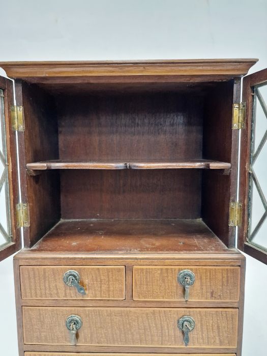 Miniature bookcase on chest of drawers with astragal glazed doors over two short and two long - Image 2 of 2