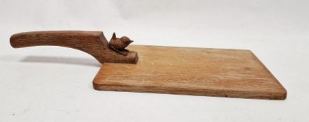 Bob Hunter 'Wren Man' oak cheeseboard of rectangular form, the handle carved with a wren, 40cm long