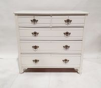 White painted oak chest of drawers with rectangular moulded top, above two short drawers, above