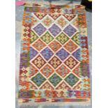 Chobi kilim cream ground wool rug with lozenge trelliswork pattern and geometric border , 130cm x