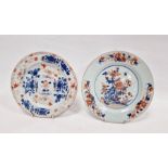 Two Chinese export Imari pattern plates, 18th century, each painted with flower sprays, one