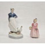 Royal Copenhagen figure of girl attending a goose, with blue wave marks, pattern no.528, on oval
