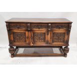 20th century oak sideboard carved in the Elizabethan-style, carved with roses and scrolling