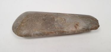 Possibly neolithic polished stone axe head, 18cm Condition ReportSurface scratches, chips to the