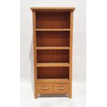 Modern beech open front bookcase, three shelves above two short drawers on square feet, H. 175cm x