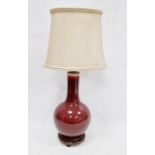 Chinese flambe bottle-shaped vase, probably 19th century, mounted as a lamp, glazed in dark red,