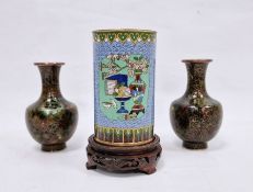 Chinese cloisonne enamel cylindrical vase, 20th century, decorated with a vase of flowers, a tazza