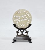 Chinese pale celadon jade carved and pierced disc, bi-carved with two figures amongst scrolling