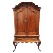 19th century continental armoire on stand, having broken-arch and cavetto cornice, shelves