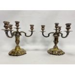 Pair of silver plated four-branch candelabra on shaped bases, 27cm high (2)