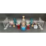 Group of eight coloured glass pedestal bowls in green, blue, amethyst, black, orange and blue