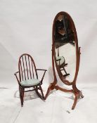 Early 20th century mahogany-framed oval cheval mirror, 167cm high and an Ercol-style dark stained