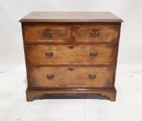 Walnut chest of drawers, two short drawers above two long drawers, on bracket feet Condition