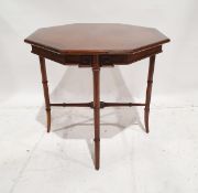 Mahogany veneered Chinese-style octagonal occasional table on bamboo turned legs, within bamboo