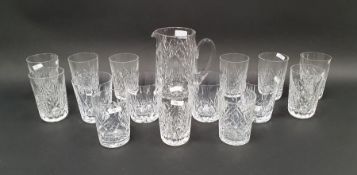 Waterford cut glass water jug, nine Waterford tumblers and six further cut glass tumblers cut with