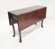 Antique mahogany drop-leaf dining table, rectangular on slight cabriole supports with scroll ears,