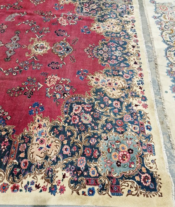 North East Persian Signed red ground Meshed carpet with large centralised floral medallion - Image 3 of 5