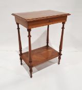 Walnut two-tier worktable with lift-up top, on turned supports